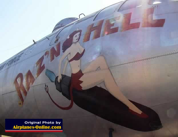 Nose art on B-29A "Raz'n Hell" in California