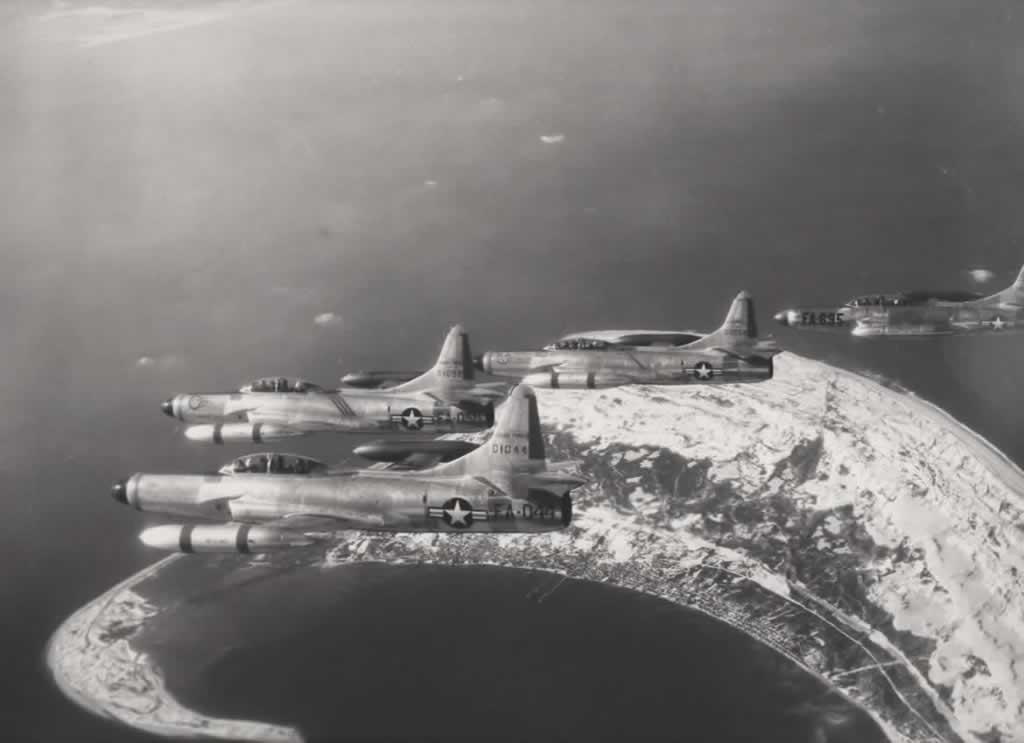 U.S. Air Force F-94C Starfires flying in information ... S/N 50-1044, Buzz Number FA-044 is in the foreground