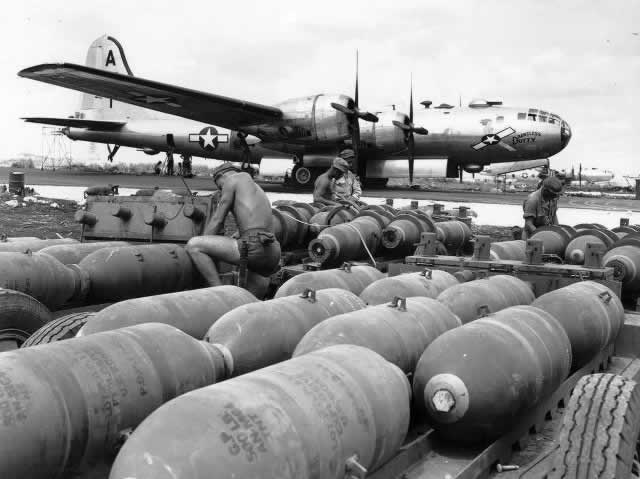 Boeing B-29 Superfortress "Dauntless Dotty" bomb loading in WWII