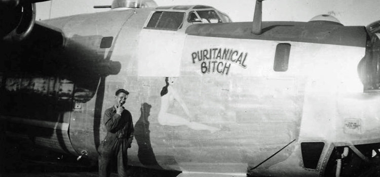 Nose art on the B-24 Liberator "Puritanical Bitch"