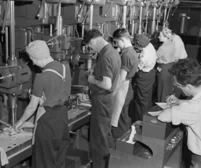 Workers at drill presses at the Ford Willow Run Plant