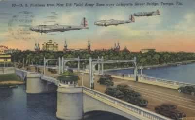 B-17 Flying Fortresses from MacDill Field Army Base over the Lafayette Street Bridge, downtown in Tampa, Florida