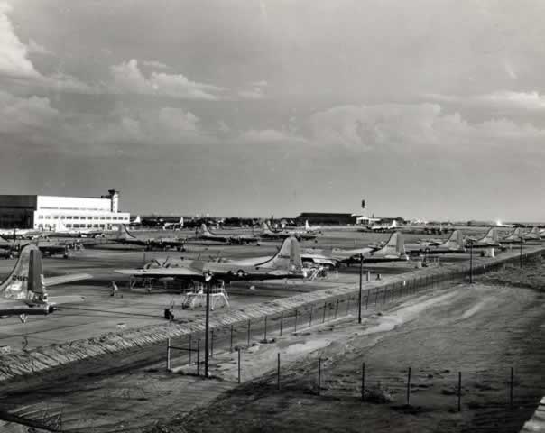 Boeing Wichita Plant, exterior view, with completed B-29s parked on tarmac